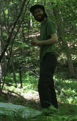 Photo of Michael LaScaleia doing fieldwork